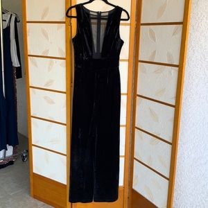 Black velvet jumpsuit with mesh insets
